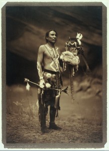 L0033500 A Navajo man in ceremonial dress representing the Yebichai g